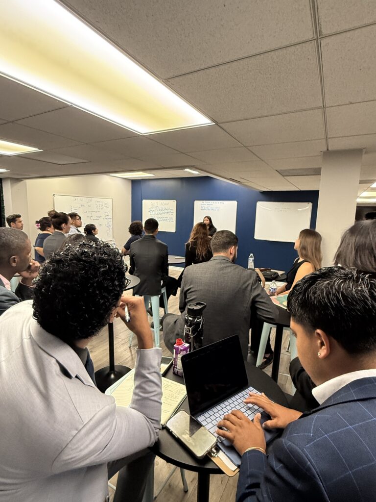 Dixon Legacy Management employee engaging with colleagues at a company event.